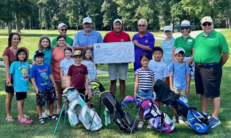 Elks Lodge 2540 of Lewes presented a check for $1,800 to the First Tee - Delaware Aug. 6, at Kings Creek Country Club, to support scholarships for children in Cape Region First Tee programs. Shown are (l-r) Ghada PapaJohn, Sophia PapaJohn, Adam PapaJohn, Yeardley Allen, Olivia Cylinder, Rich Kauffman (First Tee coach), Bryn Sweeton, Teddie Bickel, Scott Allen (First Tee), Campbell Allen, Todd Foster (Elks Club), Buddy Hall-McBride (Elks Club), Sophia Lyv, Rob Lyv , Grace Sweeten, Judy Raynor (First Tee coach), Luke Gaskill, and John Davey (First Tee coach). SUBMITTED PHOTOS